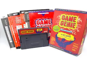 SNES Game Genie complete in box with code booklets and original cartridge